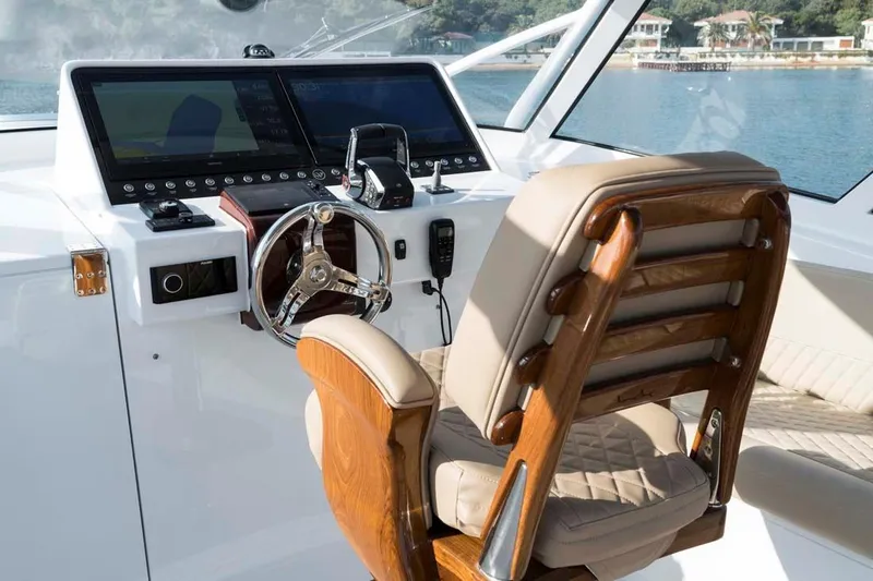 Slide: The Image of 2025 Vicem Express yacht helm with modern controls and luxurious seating. - 10