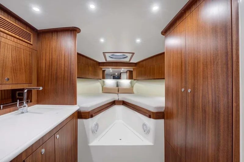 Slide: The Image of 2025 Vicem Express yacht interior with elegant wood finish and modern amenities. - 5