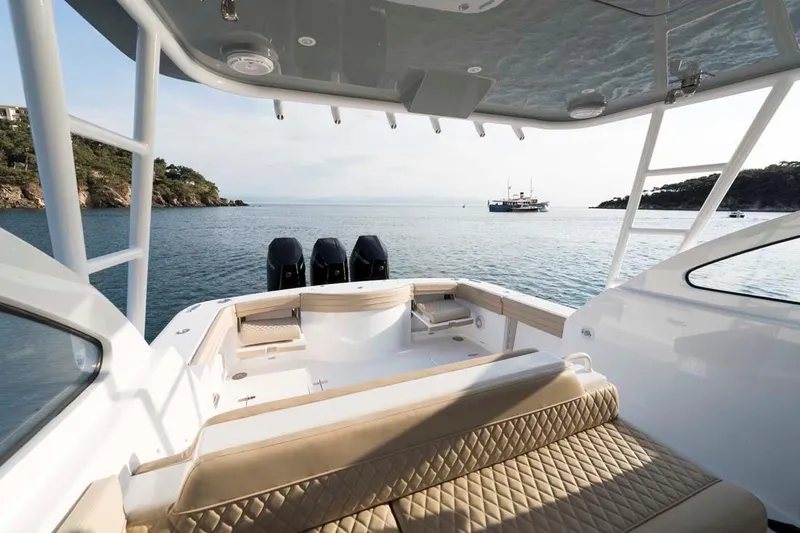 Slide: The Image of 2025 Vicem Express yacht interior with luxurious seating, overlooking serene ocean view. - 8