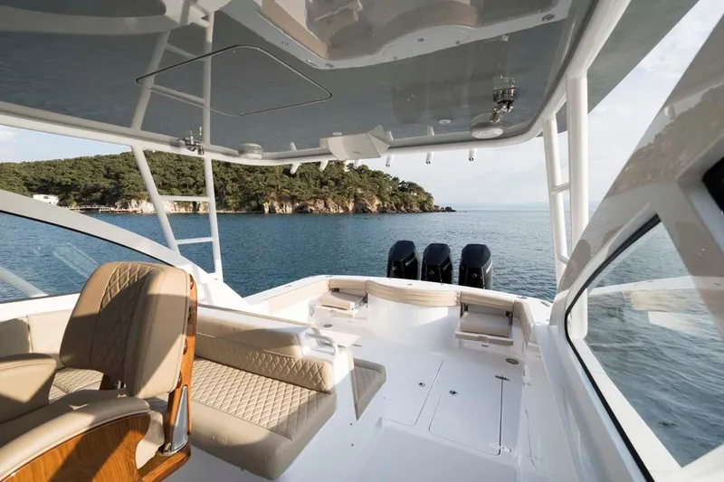 Slide: The Image of 2025 Vicem Express yacht interior with luxurious seating and ocean view. - 9