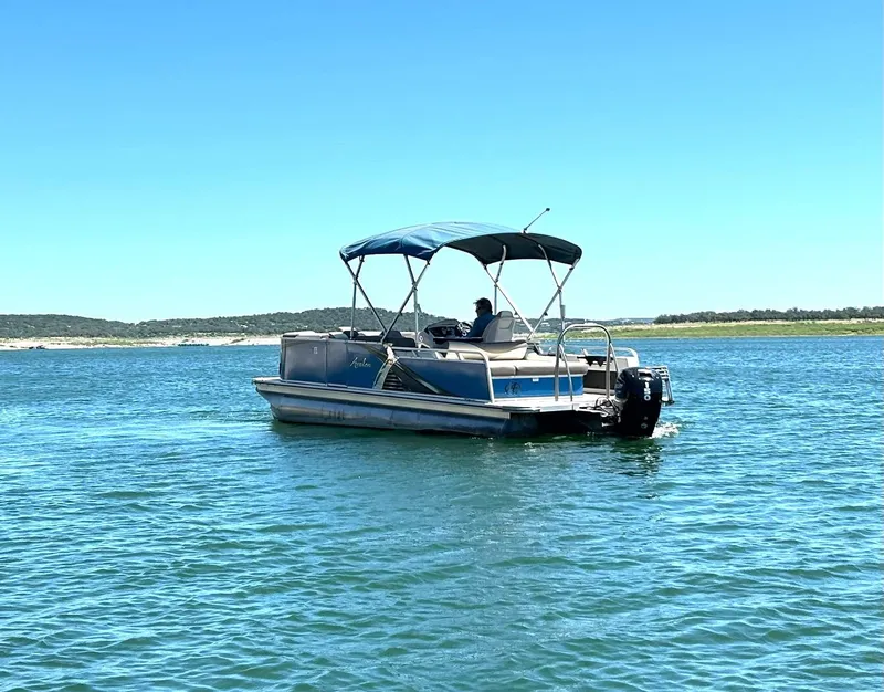 Slide: The Image of 2022 Avalon 24 LSZ VRB-3 pontoon boat on a sunny lake. - 15