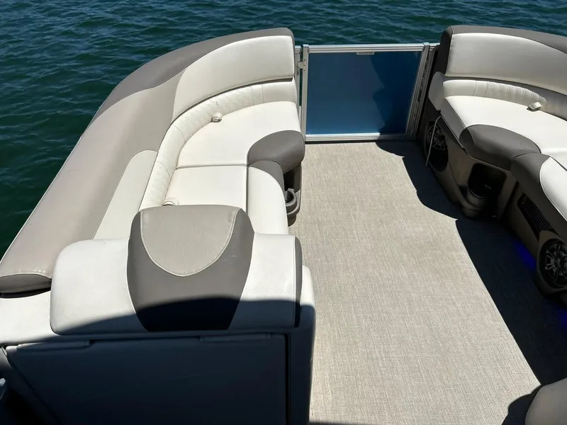 Slide: The Image of 2022 Avalon 24 LSZ VRB-3 pontoon boat interior with gray seating and open deck. - 19