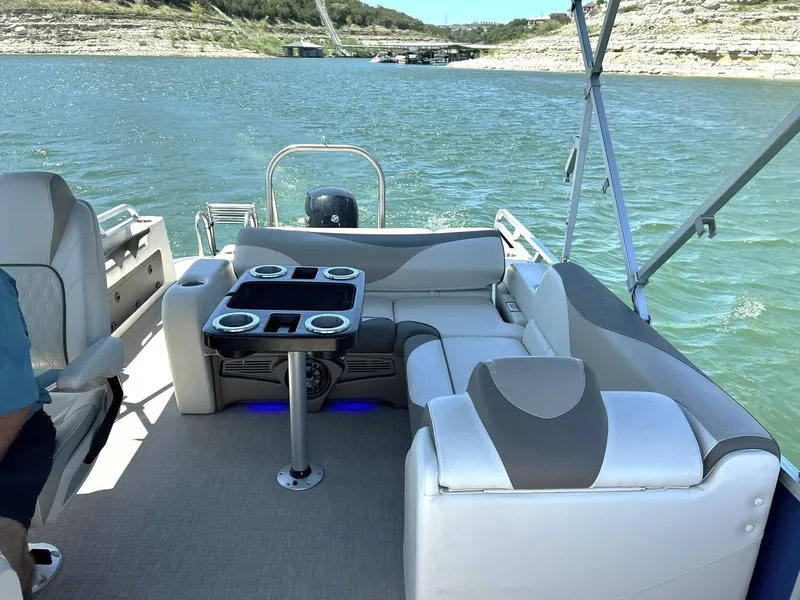 Slide: The Image of 2022 Avalon 24 LSZ VRB-3 pontoon boat interior on a scenic lake. - 30