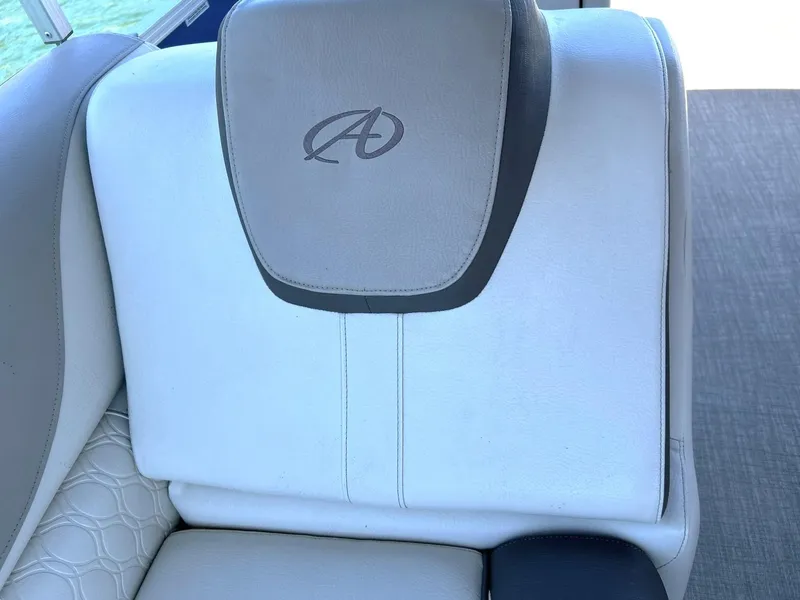Slide: The Image of White leather seat with logo in Avalon 24 LSZ VRB-3, 2022 model. - 32