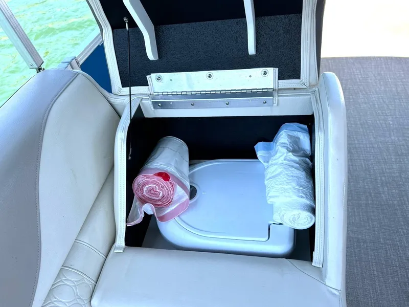 Slide: The Image of Storage compartment in 2022 Avalon 24 LSZ VRB-3 boat with supplies. - 33