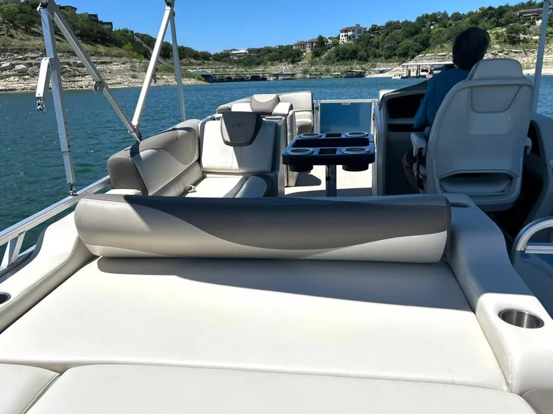 Slide: The Image of 2022 Avalon 24 LSZ VRB-3 pontoon boat interior on a scenic lake. - 42