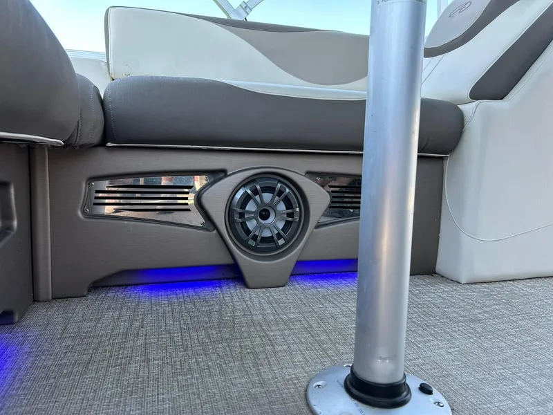 Slide: The Image of 2022 Avalon 24 LSZ VRB-3 boat interior with speaker and blue LED lighting. - 48