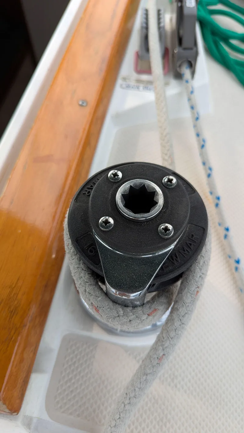 Slide: The Image of Winch on 1988 Catalina 30 MkII sailboat with rope and wooden trim. - 12