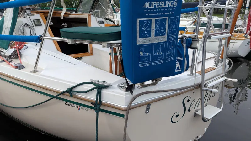 Slide: The Image of 1988 Catalina 30 MkII sailboat with Lifesling rescue system at dock. - 15