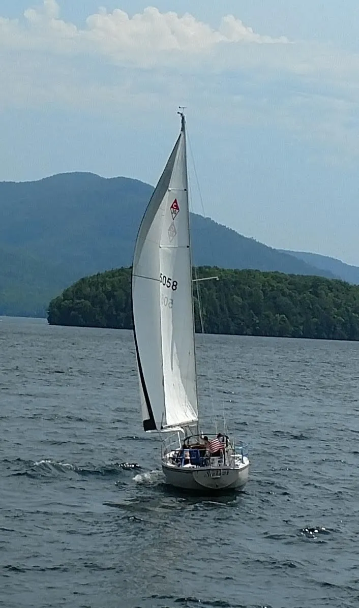 Slide: The Image of Sailboat Catalina 30 MkII (1988) on a lake with mountainous backdrop. - 36