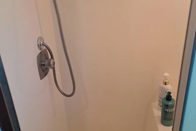 Slide: The Image of Shower area in 1978 Hatteras 37 Convertible yacht with toiletries. - 21