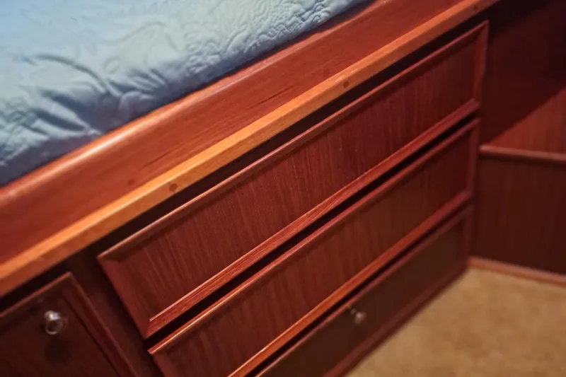 Slide: The Image of Wooden cabinetry detail in a 1978 Hatteras 37 Convertible boat interior. - 29