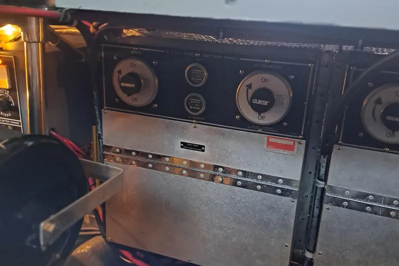 Slide: The Image of Electrical panel of 1978 Hatteras 37 Convertible yacht with battery switches. - 38