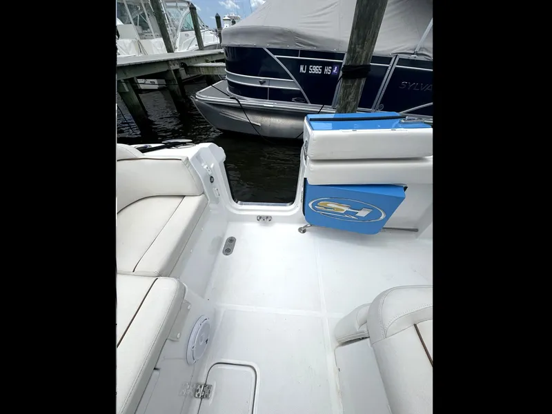 Slide: The Image of Interior view of 2022 Sea Hunt Ultra 275 SE boat with seating and storage. - 33