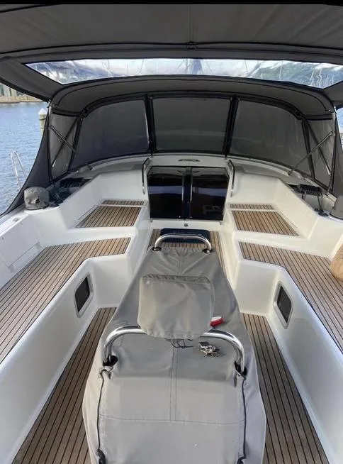 Slide: The Image of 2016 Jeanneau Yachts 58 cockpit with sleek design and spacious seating area. - 8
