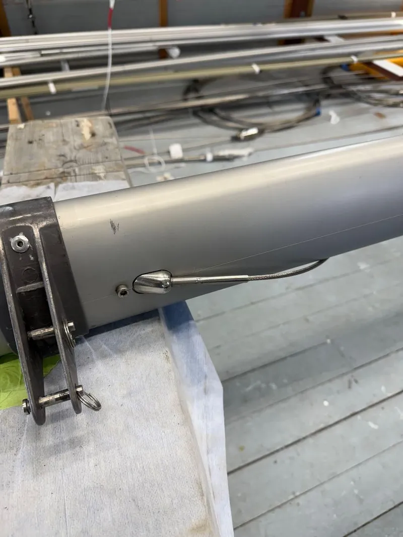 Slide: The Image of Close-up of a 2006 Mas Mini Transat 6.50 sailboat mast with rigging details. - 16