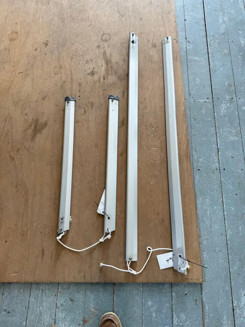 Slide: The Image of Four fluorescent light fixtures on wooden and concrete floor. - 18