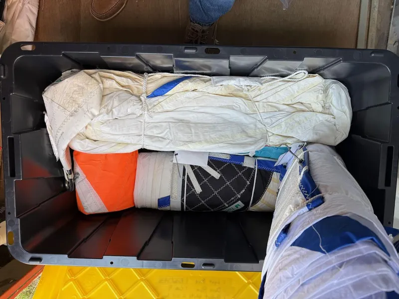 Slide: The Image of Sails stored in a container for a 2006 Mas Mini Transat 6.50 sailboat. - 23