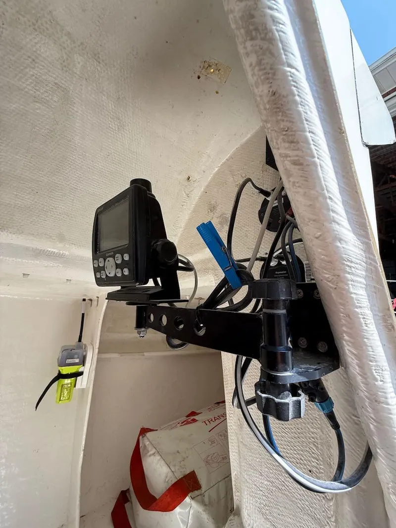 Slide: The Image of Interior of 2006 Mas Mini Transat 6.50 with navigation equipment and wiring. - 41