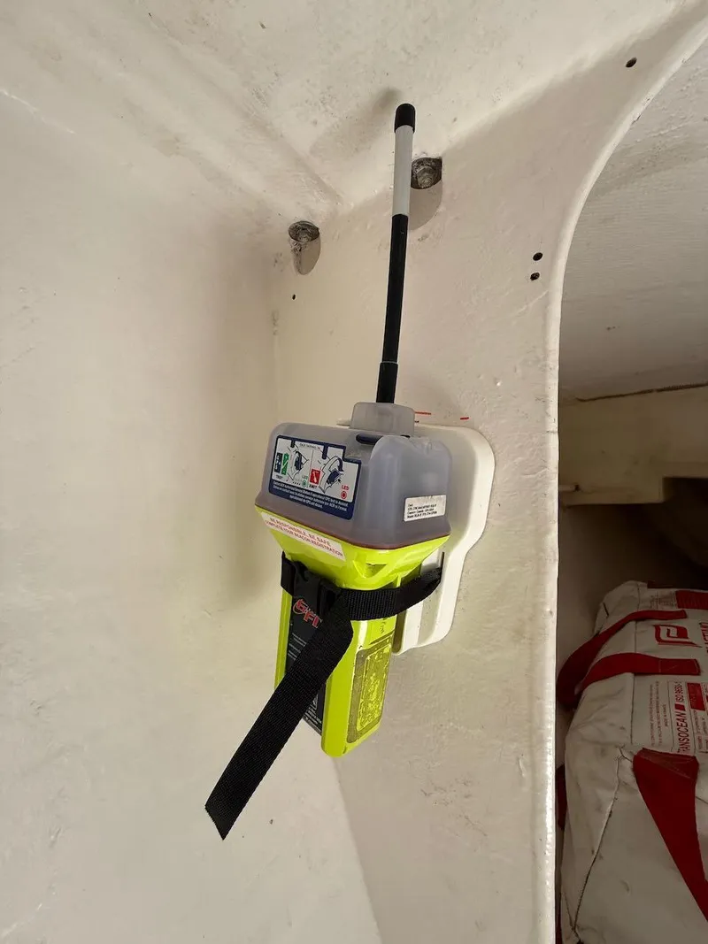 Slide: The Image of Emergency beacon mounted inside 2006 Mas Mini Transat 6.50 sailboat. - 48