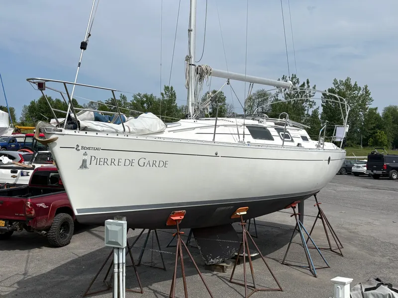 Slide: The Image of 1989 Beneteau 32s5 sailboat "Pierre de Garde" on stands in a boatyard. - 1