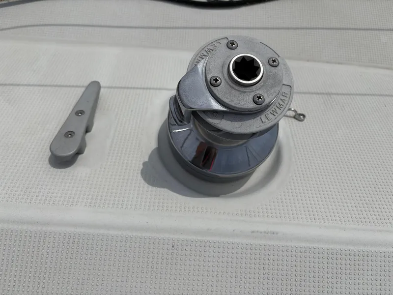 Slide: The Image of Winch and cleat on 1989 Beneteau 32s5 sailboat deck. - 14
