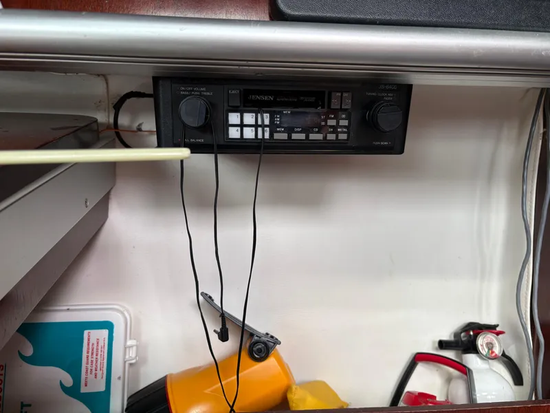 Slide: The Image of Jensen stereo system in a 1989 Beneteau 32s5 yacht interior. - 36