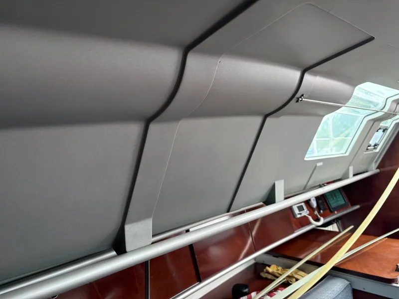 Slide: The Image of Interior of a 1989 Beneteau 32s5 sailboat, featuring sleek design and modern equipment. - 49
