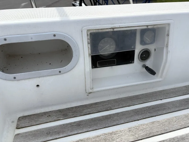 Slide: The Image of Control panel of a 1989 Beneteau 32s5 sailboat with gauges and switches. - 11