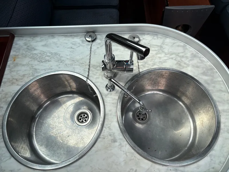 Slide: The Image of Stainless steel double sink with faucet on Beneteau 32s5 yacht, 1989 model. - 40