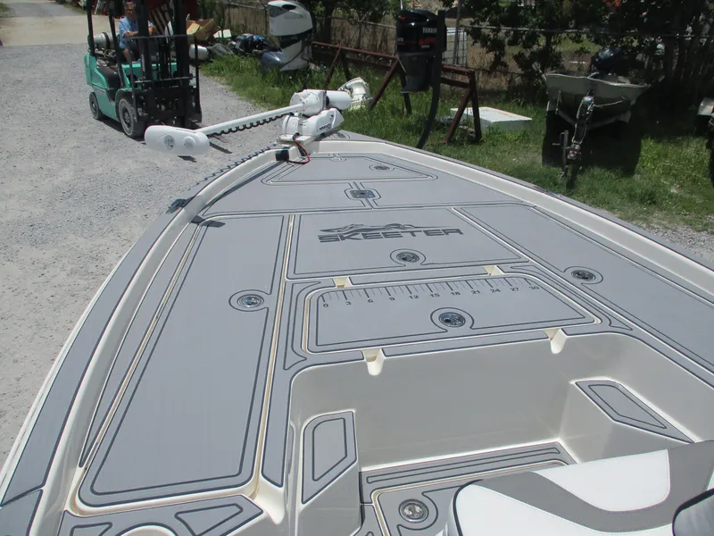 Slide: The Image of 2023 Skeeter SX 240 boat deck with detailed design and measurement markings. - 14