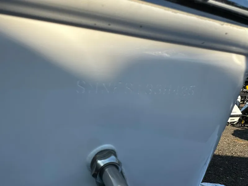 Slide: The Image of 2025 Sportsman Open 232 Center Console hull detail with serial number visible. - 30