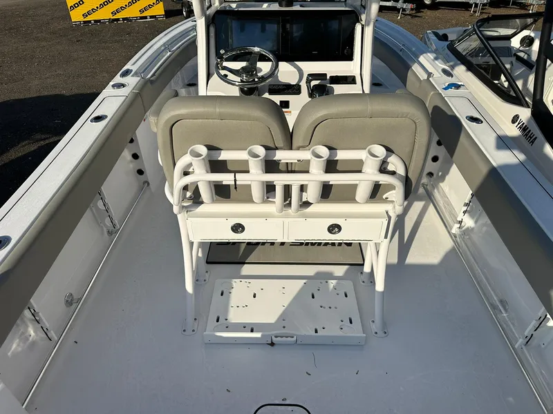 Slide: The Image of 2025 Sportsman Open 232 Center Console boat interior with dual seats and steering console. - 8