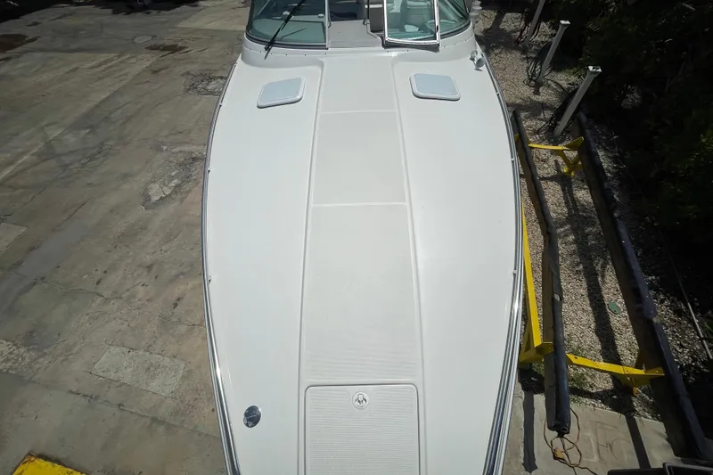 Slide: The Image of Top view of a 2000 Formula 330 SS boat on a dry dock. - 15