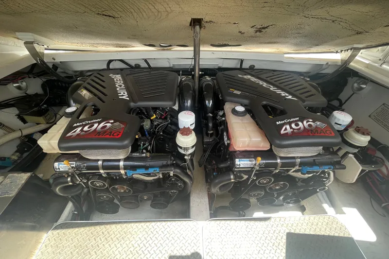 Slide: The Image of Twin Mercury MerCruiser 496 MAG engines in a 2000 Formula 330 SS boat. - 16