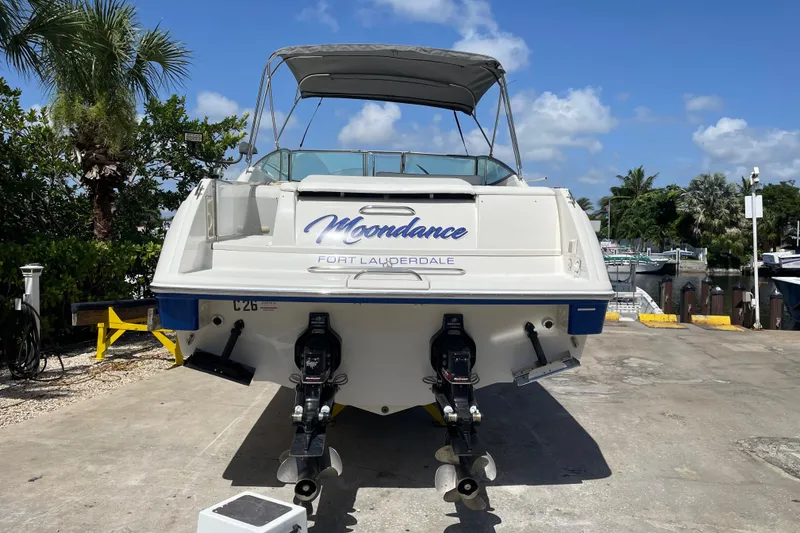 Slide: The Image of 2000 Formula 330 SS boat named "Moondance" docked in Fort Lauderdale marina. - 3