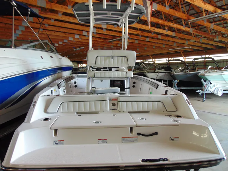 Slide: The Image of Yamaha 190 FSH Sport 2024 in a boat storage facility. - 3