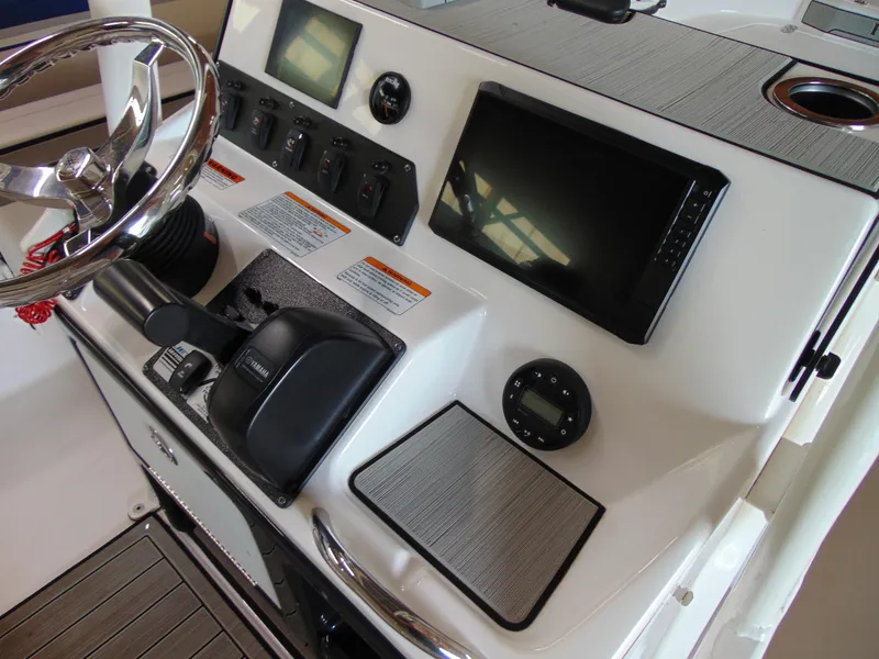 Slide: The Image of Dashboard of 2024 Yamaha 190 FSH Sport with controls and display. - 6