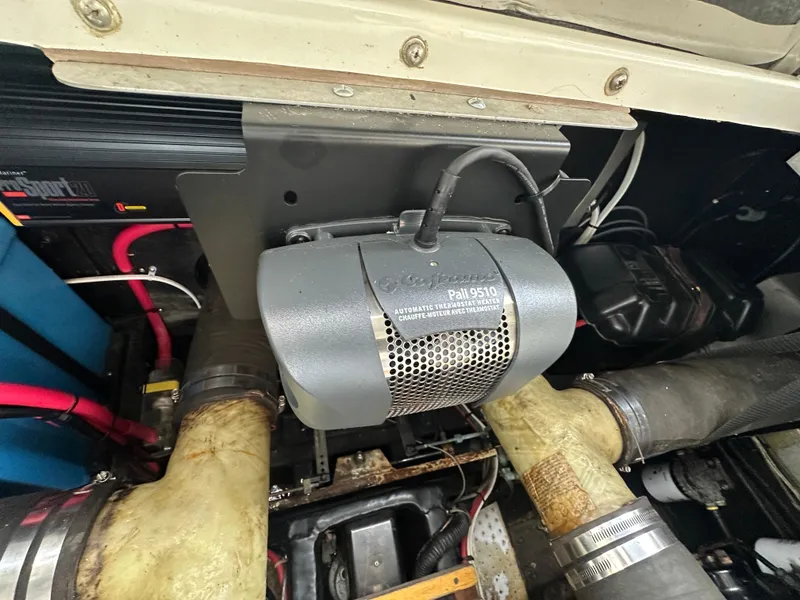 Slide: The Image of Engine compartment of a 1988 Carver 280 Voyager boat, featuring a Pall 9510 component. - 24