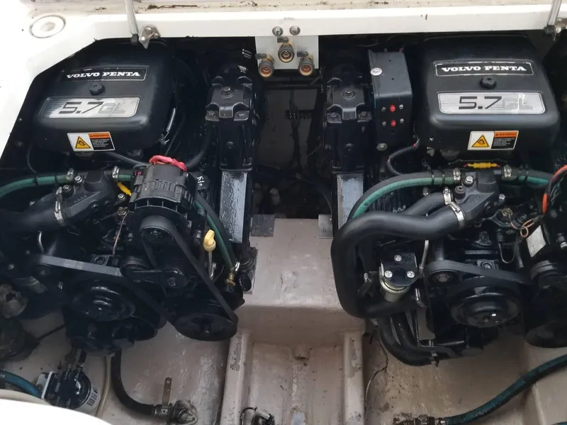 Slide: The Image of Twin Volvo Penta 5.7GL engines in a 2000 Wellcraft 3000 Martinique boat. - 14