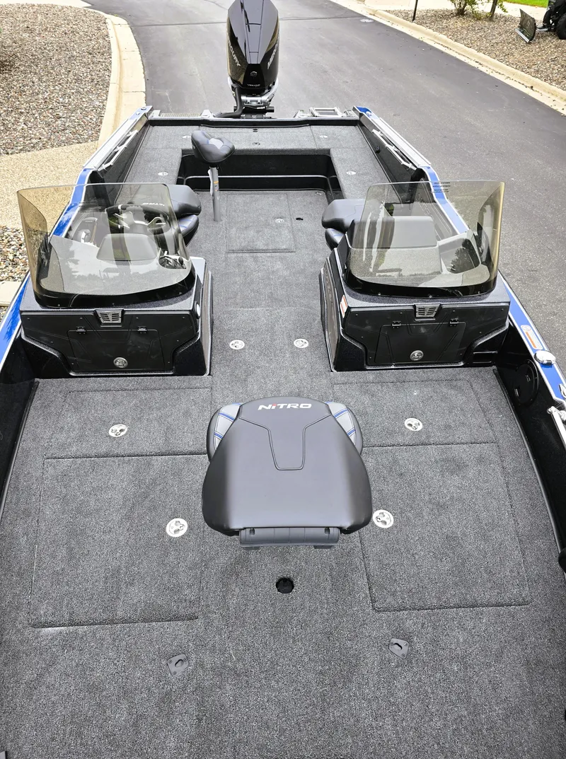 Slide: The Image of 2025 Nitro ZV21 boat interior with dual consoles and spacious deck. - 3