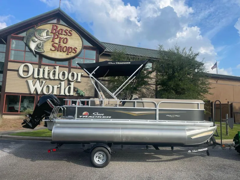 The Image of 2025 Sun Tracker Party Barge 18 DLX pontoon boat at Bass Pro Shops Outdoor World. - 0