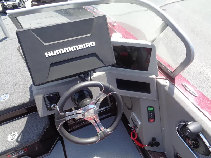 Slide: The Image of 2022 Ranger 621 FS PRO boat dashboard with Humminbird display and steering wheel. - 4