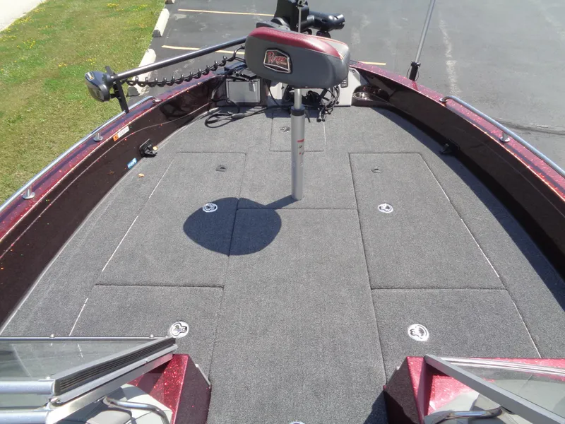 Slide: The Image of 2022 Ranger 621 FS PRO boat deck with carpeted surface and fishing seat. - 5