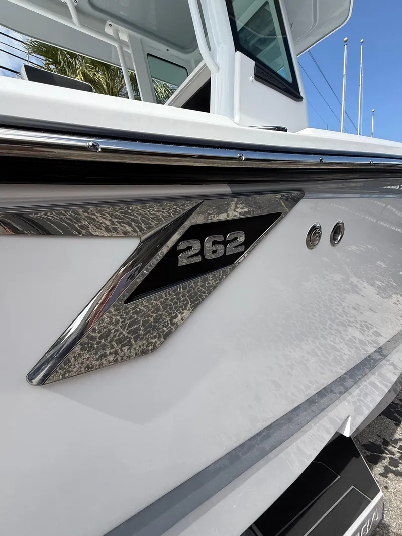 Slide: The Image of 2026 Blackfin 262 HB boat exterior with sleek design and chrome accents. - 6