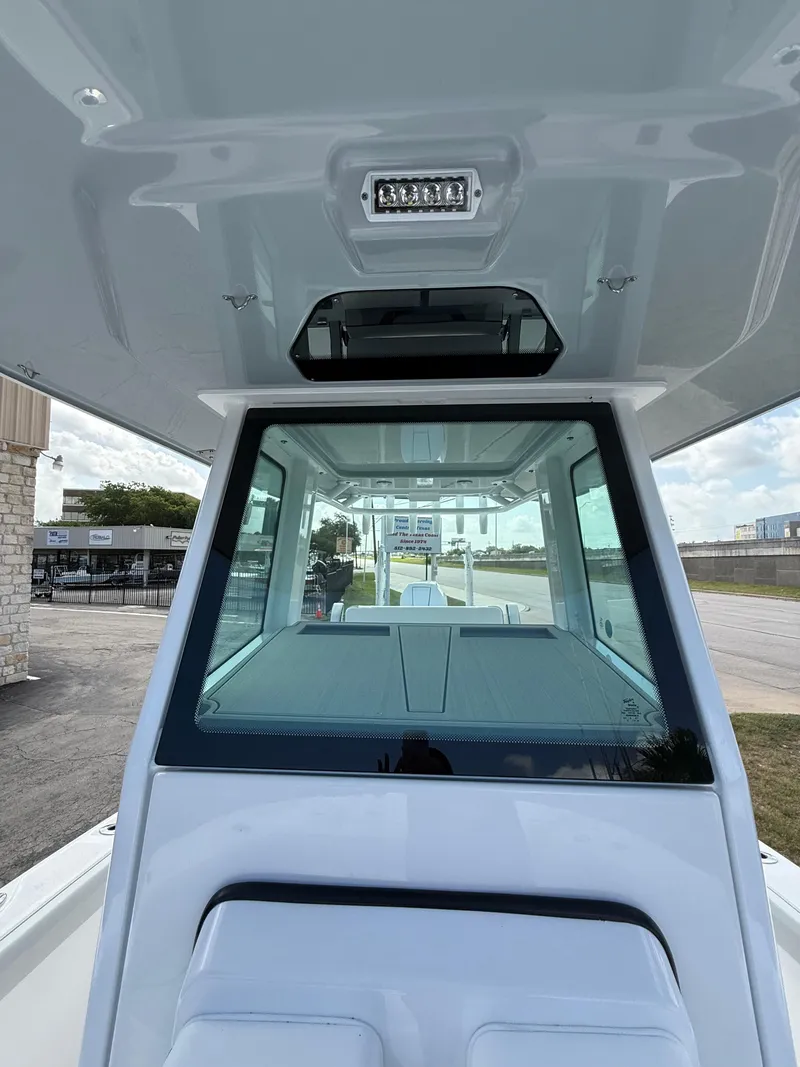 Slide: The Image of 2026 Blackfin 262 HB boat interior view with modern design and spacious cabin. - 9