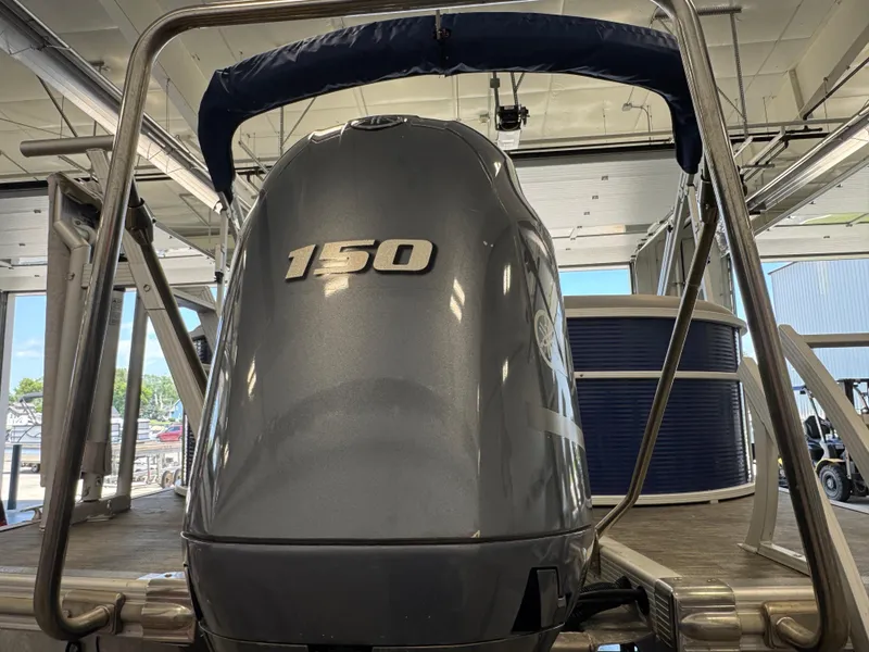 Slide: The Image of 2020 Bennington SX 22 SSRX boat with 150 horsepower engine in showroom. - 3