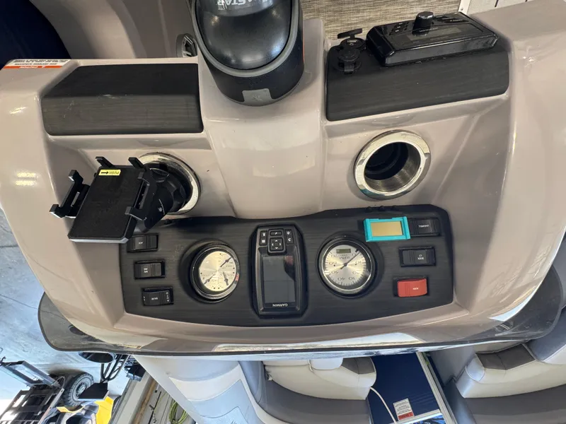 Slide: The Image of Control panel of a 2020 Bennington SX 22 SSRX boat with gauges and switches. - 7