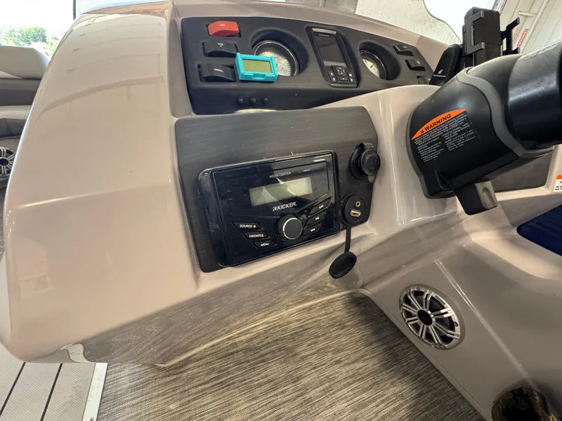 Slide: The Image of Control panel of 2020 Bennington SX 22 SSRX boat with audio system and gauges. - 8