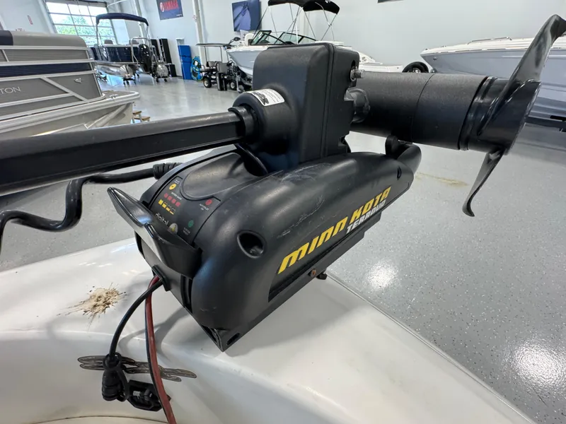 Slide: The Image of Minn Kota Terrova trolling motor on 2001 Glastron SX175 boat in showroom. - 14